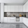 Glossy White L-Shaped Kitchen Design With Marble Top