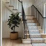 L-Shaped Staircase Design with Wooden Treads and Metal Handrails