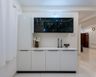 White Crockery Unit Design with Cabinets and Tall Unit