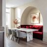 Dining Room Design With Marble Table and Red Velvet Seating