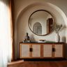 Foyer Design with Circular Mirror and Cane-Wood Cabinetry
