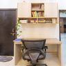 Home Office Design With Ergonomic Chair and Wood Storage
