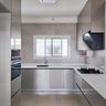 U-Shaped Kitchen Design with Grey Units and and White Marble Countertop