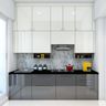 Open Kitchen Design with Grey and White Cabinets and Marble Backsplash