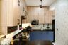 U Shaped Kitchen Design in Blue and Wood Finish With Black Granite Countertop