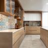 Island kitchen with colorful patterned backsplash and wood-and-white cabinetry