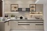L-Shaped Kitchen Design with Quartz Countertops and Two-Tone Cabinets