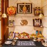 Wooden Pooja Design with Brass Lamps and Open Shelves