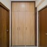 3-Door White Swing Wardrobe Design with High Gloss Finish