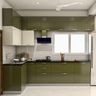 Green and White L-Shaped Kitchen Design with Granite Stone Countertop and Glossy Cabinets