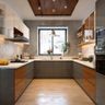 U-shaped kitchen with dual-tone cabinetry, patterned backsplash, and pendant lighting