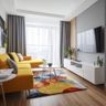 Living Room Design with Bright Yellow Sofa