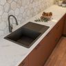 Top mount black quartz kitchen sink design