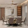 Modern Dining Room Design with Dark Marble and Gold Sculptural Table