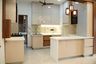 L-Shaped Kitchen Design with Island and Quartz Countertop