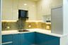 L-Shaped Kitchen Design with Glossy Champagne Cabinets