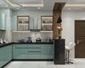 Metallic Blue U-Shaped Kitchen Design With Seating and Granite Countertop