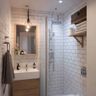 White Bathroom Design with Subway Tiles and Floating Vanity