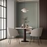 Dining room with round table, modern pendant light, and pastel-colored walls