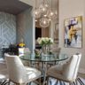 Dining Room Design with Round Glass Table and Compact Bar Storage