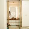 Pooja Room Design with Concealed Storage and Lotus Motif