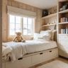 Bedroom Space Saving Design with Under-Bed Storage and Paneled Wall Shelves