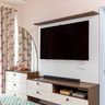 Multi-functional TV unit with dresser and mirror, featuring drawers and open shelves