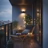 Balcony Design with Cozy Lights and Wooden Lounge Chair