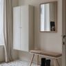 White Foyer Design with Seating Bench