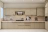 Irish Cream L-Shaped Kitchen Design with Quartz Countertop and Suede Finish Cabinets