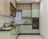 Sage Green Modern L-Shaped Kitchen Design with Tall Pantry Storage
