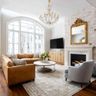 Living Room Design with L-Shaped Brown Sofa and Grey Accent Chairs