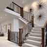L-Shaped Staircase Design with Wood, Concrete, and Metal Elements