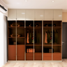 Contemporary Wardrobe with Tinted Glass - Livspace