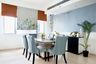 6-Seater Dining Room With Blue Cushioned Chairs And Dual-Tone Walls - Livspace