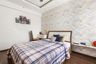 10x8 Ft Guest Room Design With Abstract Geometric Wallpaper - Livspace