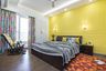 12X9 Ft Guest Room Design With Yellow Accent Wall - Livspace