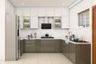 L-Shaped Kitchen Design With Storage Cabinets Featuring A Glossy Laminate Finish - Livspace