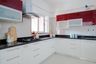 White and Red Modular L-Shaped Kitchen Design