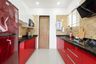 Modular Parallel Kitchen Design with Red Cabinets