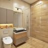 Brown and Beige Tiled Bathroom Design