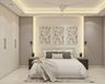 Modern Guest Room Design With White Bed, 4-Door White Swing Wardrobe, Wooden Side Tables And Cream-Toned Lit Wall Niche - Livspace