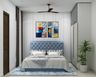 Compact Modern Guest Bedroom with Queen Bed, Blue Upholstered Headboard, Sliding Wardrobe, and Abstract Wall Art - Livspace