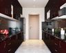 Parallel kitchen design with black cabinets
