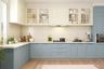 L-shaped kitchen design with light blue cabinets