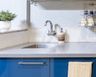 Stainless Steel Top Mount Single Bowl Kitchen Sink With Grey Countertop And Blue Cabinets - Livspace