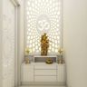 Compact White Mandir Design With Wall-Mounted Drawer Storage, Om Mandala And Ornate Door - Livspace