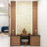 Beige And Wood Floor-Mounted Mandir Design With Wooden Wall Panelling And Beige Textured Wallpaper - Livspace