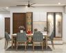Dining room design with 6-seater white table, grey chairs, and crockery units and pooja unit - Livspace