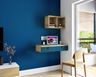 Home office design with dark blue wall